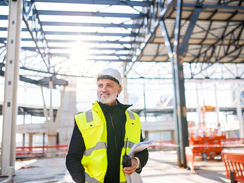 man-engineer-with-walkie-talkie-standing-on-constr-small.jpg